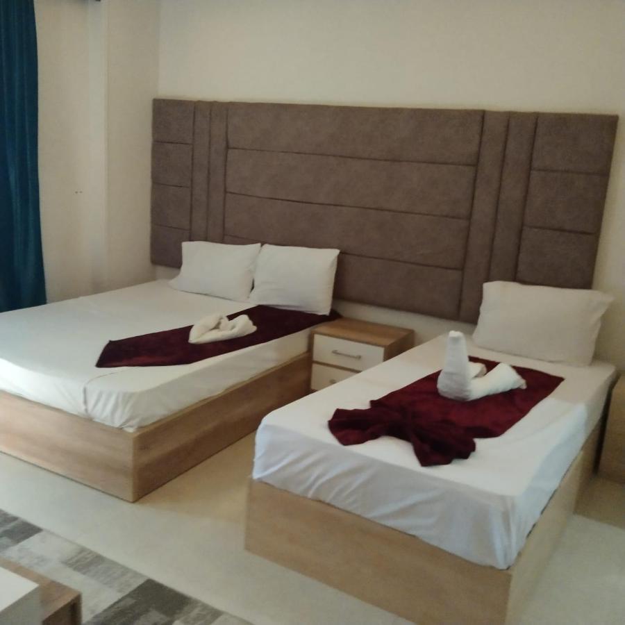 Gardenia Inn Nazlet el-Sisi Bagian luar foto